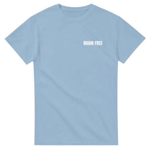Light blue unisex t-shirt with 'ROAM FREE' white text on chest, outdoor streetwear style