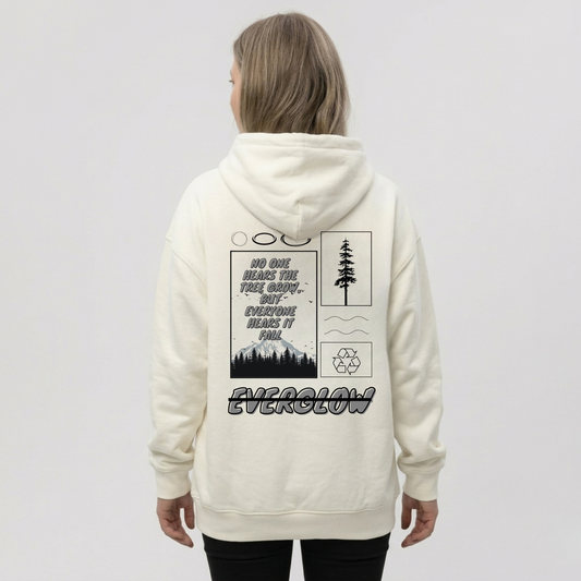 A person wears the Everglow: Silent Growth cozy fleece hoodie with graphic designs of trees, mountains, a recycling symbol, and the words "No one hears the tree grow…but everyone hears it fall" and "EVERGLOW" on the back.